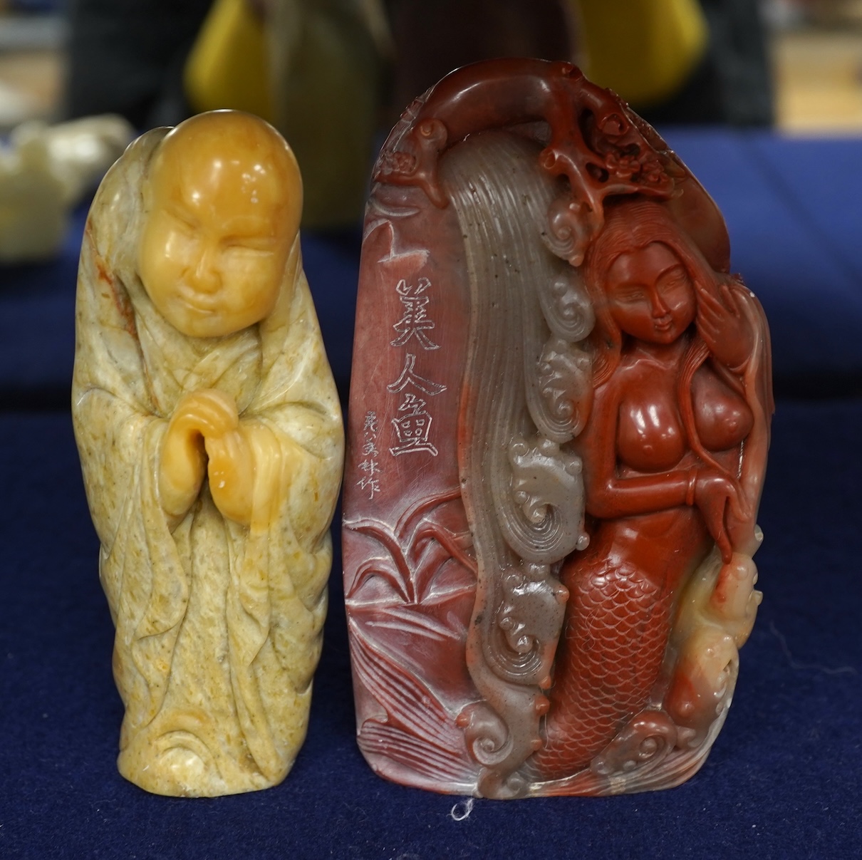 A Chinese white jade 'boys with jar' carving and three shoushan stone figures; luohan, girl with squirrel and mermaid (4), tallest 11cm